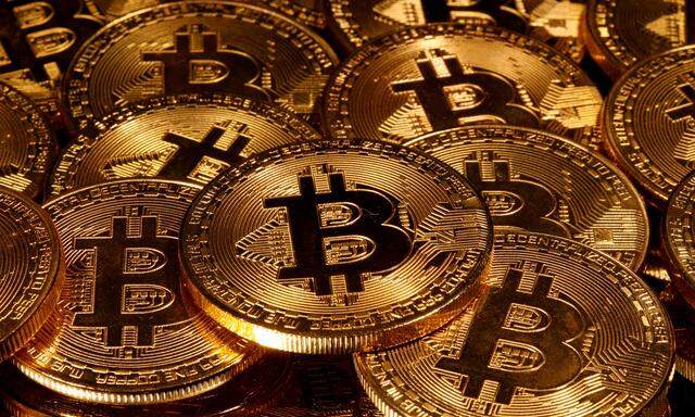 FILE PHOTO: Representations of virtual currency Bitcoin are seen in this picture illustration taken