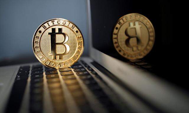 A Bitcoin (virtual currency) coin is seen in an illustration picture taken at La Maison du Bitcoin in Paris