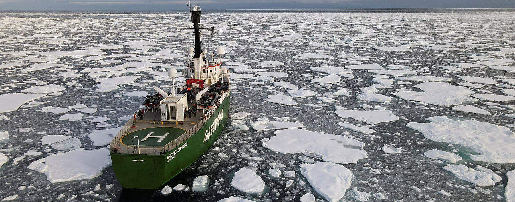 FILE PHOTO: Greenpeace's Arctic Sunrise ship navigates through floating ice in the Arctic Ocean