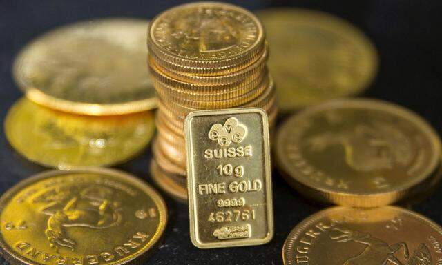 Gold bullion is displayed at Hatton Garden Metals precious metal dealers in London, Britain