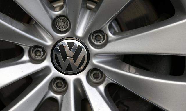 The VW logo is pictured on a wheel of a Volkswagen car at a car shop in Bad Honnef