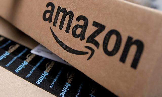 FILE PHOTO: Amazon boxes are seen stacked for delivery in the Manhattan borough of New York City