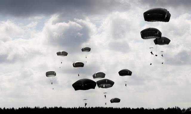 U.S. paratroopers of the 173rd Airborne Brigade take part in sky jump ´Bayonet Strike´ excercise in Adazi