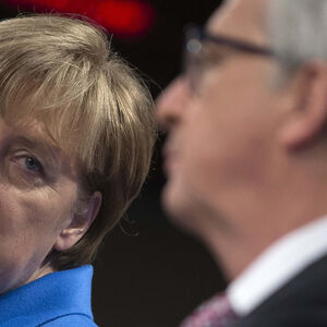 German Chancellor Merkel holds a joint news conference with European Commission President Juncker at the EC headquarters in Brussels