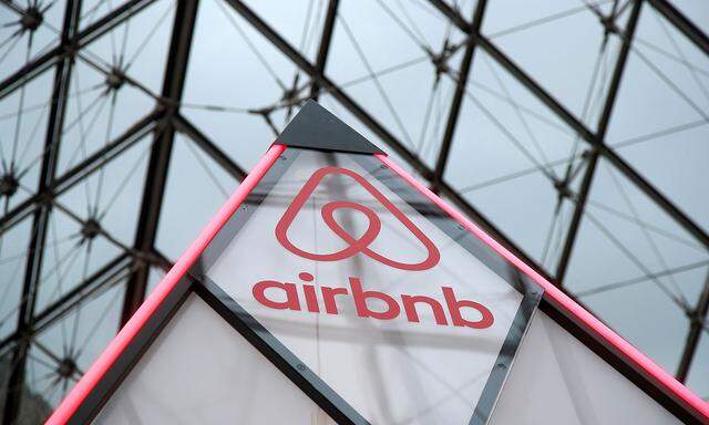 FILE PHOTO: Airbnb logo is seen on a little mini pyramid under the glass Pyramid of the Louvre museum in Paris