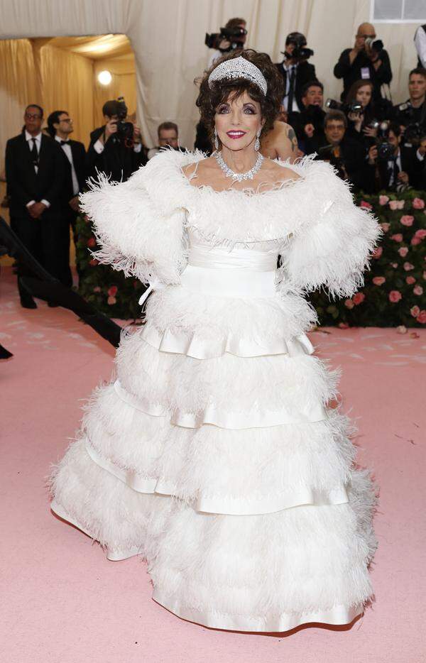 Joan Collins in Valentino.