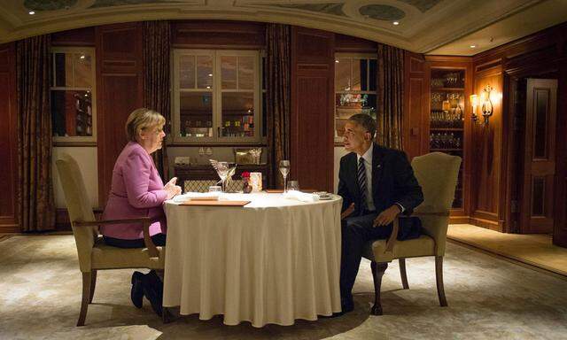 U.S. President Barack Obama and Chancellor Angela Merkel attend a private dinner at the famous Adlon hotel in Berlin