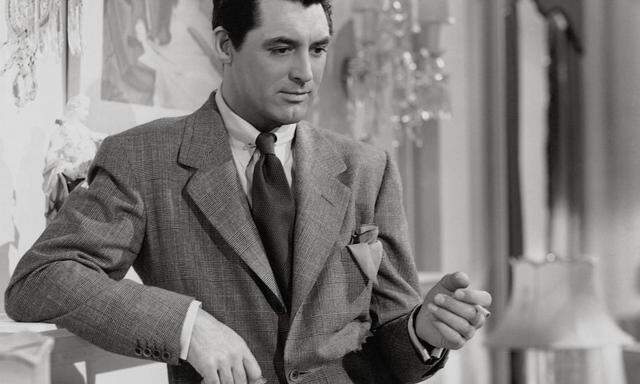 Kühl gestylte Männlichkeit. Der legendäre Anzugträger Cary Grant in „The Philadelphia Story“, 1949.