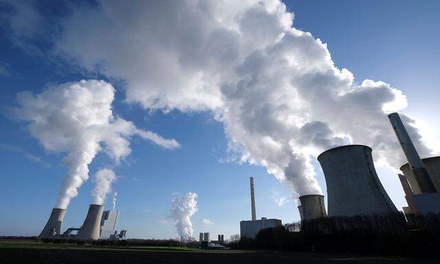 FILE PHOTO: The lignite power plants of 'Neurath New', Niederaussem, and 'Neurath Old' of German energy supplier and utility RWE are pictured in Neurath