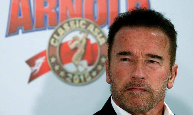 Actor and former professional bodybuilder Arnold Schwarzenegger attends a news conference in Hong Kong