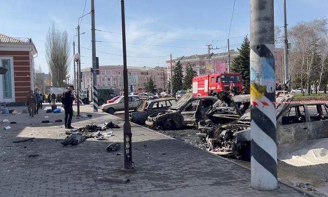 Damaged cars and debris are seen after a missile strike on a railway station in Kramatorsk