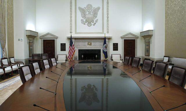 The conference table of the Federal Reserve Board of Governor is seen empty at Federal Reserve Board headquarters before new Chairwoman Janet Yellen took the oath of office in the conference room at the Federal Reserve Board in Washington