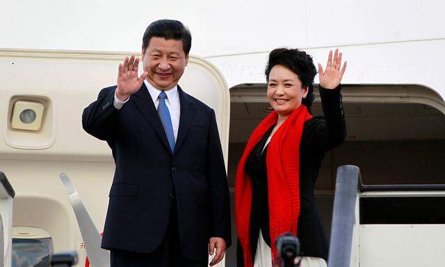 Chinas Staatschef Xi Jinping mit seiner Ehefrau.
