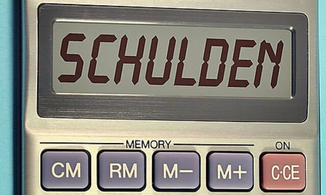 Symbolbild Taschenrechner Schulden