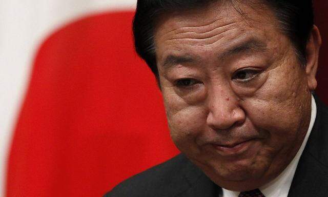 Japan's Prime Minister Yoshihiko Noda attends at a news conference at his official residence in Tokyo