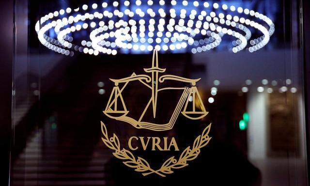 FILE PHOTO: The logo of the European Court of Justice is pictured outside the main courtroom in Luxembourg
