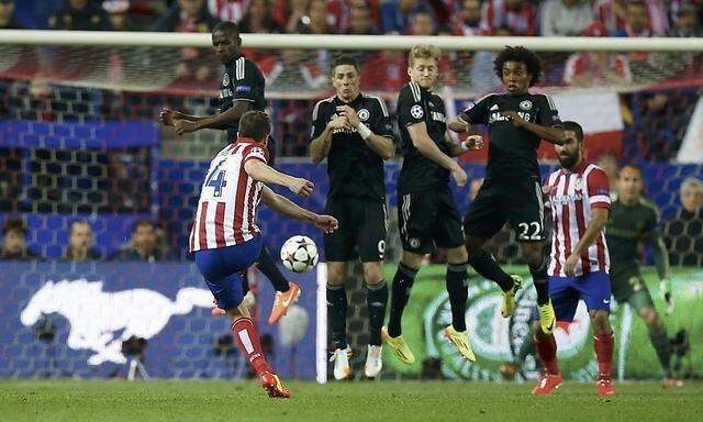 Atletico Madrid's Gabi kicks the ball during their Champions League semi-final first leg soccer match against Chelsea at Vicente Calderon stadium in Madrid