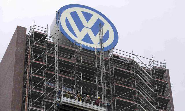 Volkswagen logo sits atop company´s headquarters in Wolfsburg