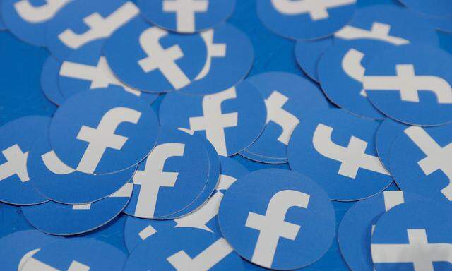 FILE PHOTO: Stickers bearing the Facebook logo are pictured at Facebook Inc´s F8 developers conference in San Jose