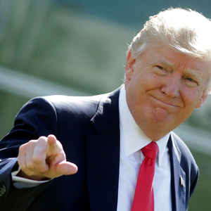 President Donald Trump walks on the South Lawn
