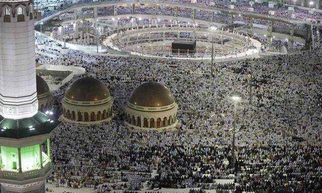 Muslim pilgrims pray around the holy Kaaba at the Grand Mosque, during the annual hajj pilgrimage in Mecca