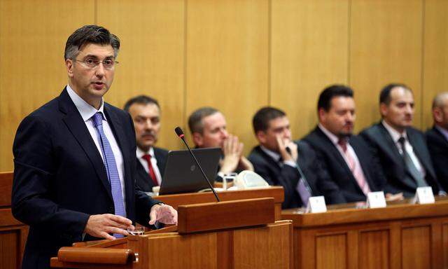 Croatia´s PM-designate Andrej Plenkovic speaks in the parliament before the government is approved in Zagreb