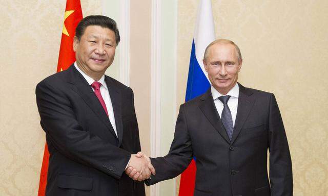 140911 DUSHANBE Sept 11 2014 Chinese President Xi Jinping L meets with his Russian coun
