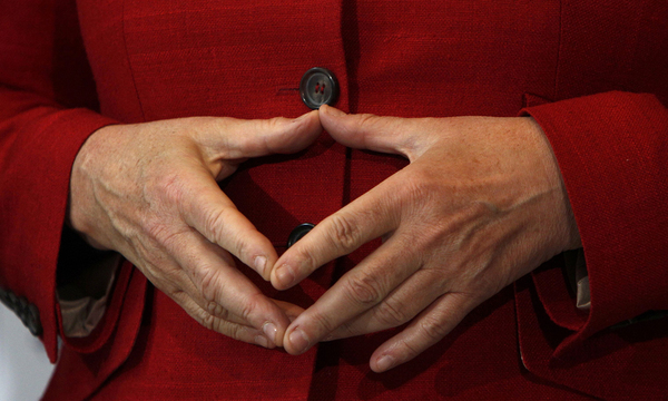 File photo of German Chancellor Merkel gesturing during German Cities Council in Stuttgart