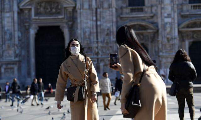 Touristen mit Schutzmasken wird man wohl noch länger sehen.