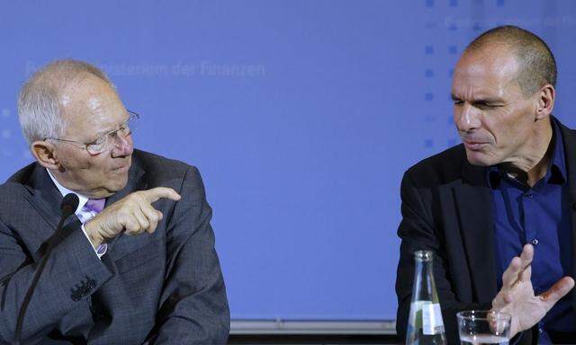 Greek Finance Minister Varoufakis and German Finance Minister Schaeuble address news conference at the finance ministry in Berlin
