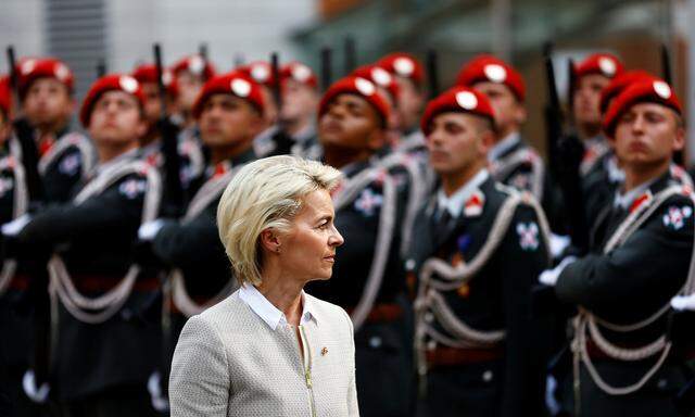 German Defence Minister von der Leyen reviews the guard of honour in Vienna
