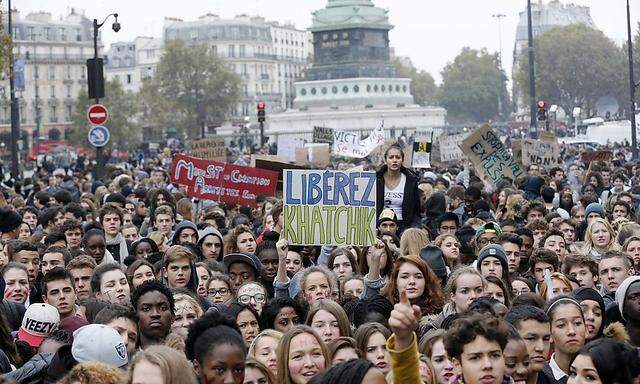 French high students shout slogans during a protest demonstration in Paris