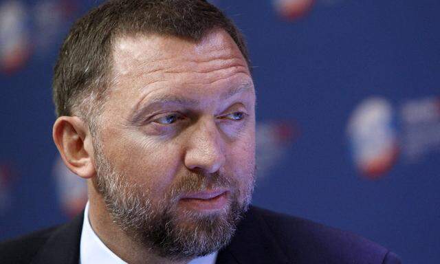 Russian tycoon Oleg Deripaska takes part in a discussion meeting at the St. Petersburg International Economic Forum in St. Petersburg