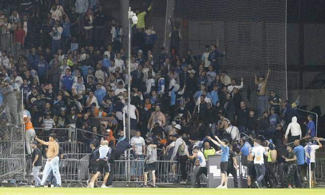 Marseille s supporters invade the field after the French L1 football match between Angers (ASCO) and Marseille (OM), at