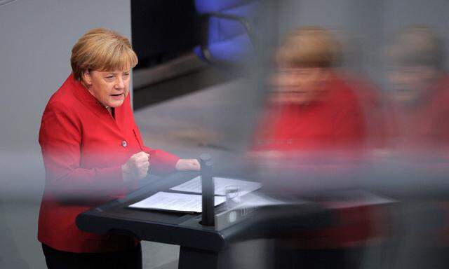 German Chancellor Angela Merkel, speaks during a meeting at the lower house of parliament Bundestag on 2017 budget in Berlin
