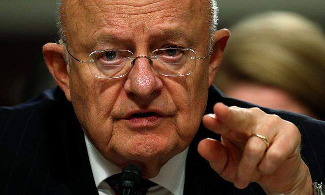 Clapper testifies before a Senate Armed Services Committee hearing on foreign cyber threats, on Capitol Hill in Washington