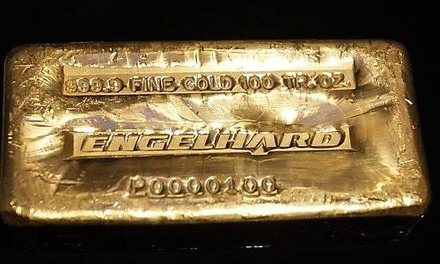 A 999.9 fine gold 100 troy ounce Engelhard gold bar is seen on the floor of the New York Stock Exchan