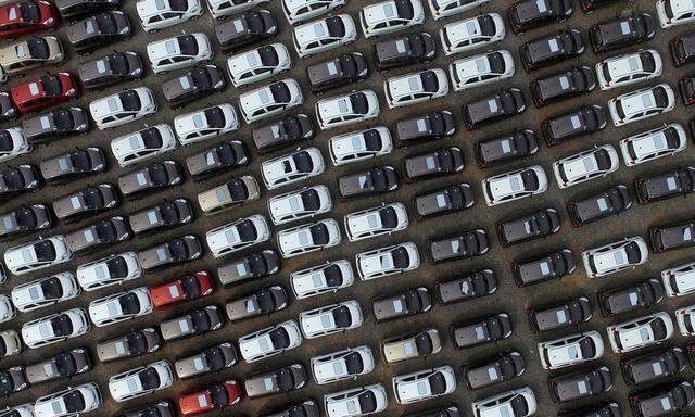 Electric cars are seen at a parking lot of an automobile factory in Xingtai, Hebei province, China 