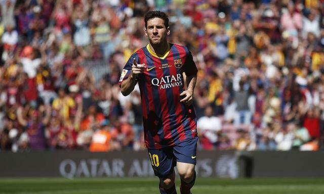 Barcelona's Lionel Messi celebrates a goal against Getafe during their La Liga soccer match at Camp Nou stadium in Barcelona