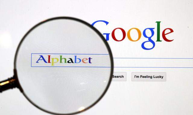 A Google search page is seen through a magnifying glass in this photo illustration taken in Berlin
