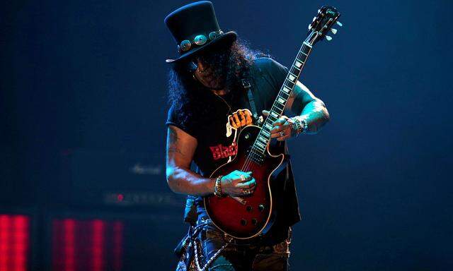 Slash, lead guitarist of U.S. rock band Guns N´ Roses, performs during their ´Not in This Lifetime... Tour´ at the du Arena in Abu Dhabi