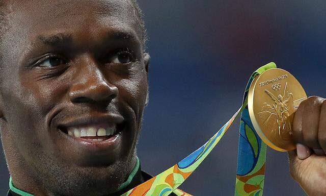 Usain Bolt mit seiner neunten Olympia-Medaille.