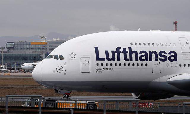 FILE PHOTO: An Airbus A380 of German air carrier Lufthansa is pulled for technical maintainance at the airport in Frankfur