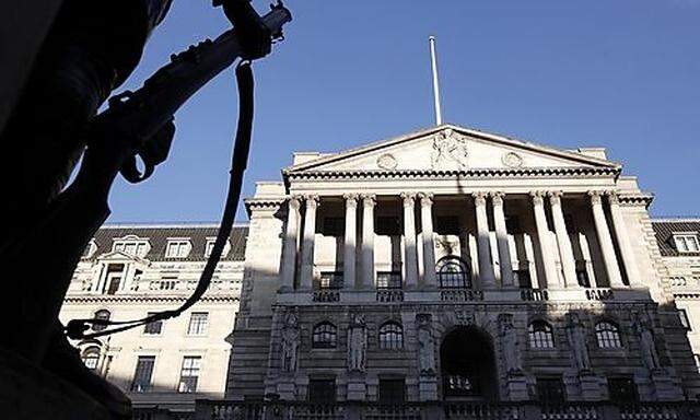 The rifle on the memorial statue of a soldier is seen outside the Bank of England in the City of Lond