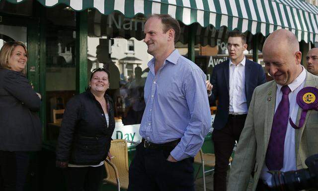 Newly elected UK Independence Party MP Douglas Carswell walks through Clacton-on-Sea