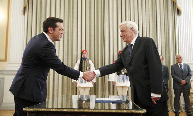 Leftist Syriza leader and winner of Greek general election Alexis Tsipras is sworn in as prime minister by Greek President Prokopis Pavlopoulos during a ceremony at the presidential palace in Athens