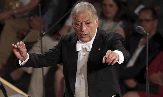 Indian conductor Zubin Mehta R during the performance with the San Carlo Theatre Chorus and Orches