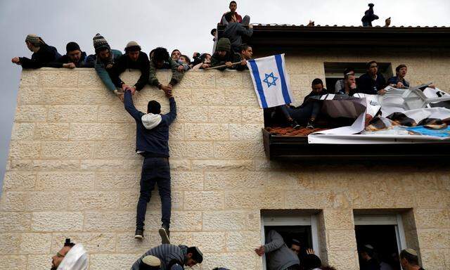 Streitthema Siedlungen. Israelische Siedler wehren sich gegen Räumung. 
