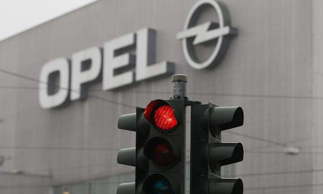 A traffic light is pictured in front of the Opel plant in Bochum
