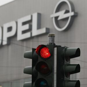A traffic light is pictured in front of the Opel plant in Bochum